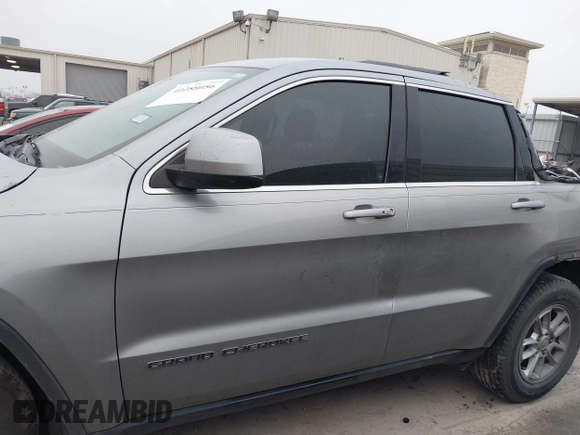 2018 Jeep Grand Cherokee Laredo E with VIN 1C4RJEAG8JC382825, listed as a IAAI auction lot 41288056 with 105,652 mi miles. Bid and sale history available at carsss.com. Image 14.