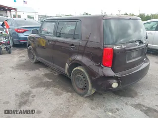 2010 Scion xB with VIN JTLZE4FE2A1117808, listed as a IAAI auction lot 41910113 with 242,060 mi miles. Bid and sale history available at carsss.com. Image 3.