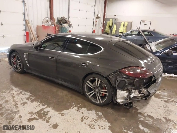 2012 Porsche Panamera Turbo with VIN WP0AC2A78CL090309, listed as a IAAI auction lot 41597860 with 58,447 mi miles. Bid and sale history available at carsss.com. Image 3.