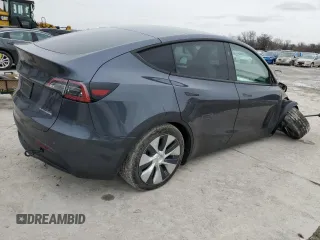 2023 Tesla Model Y Long Range z VIN 7SAYGDEE8PF884567, wystawiony jako Copart lot #45181465 z przebiegiem 16 653 mil mil oraz Szkoda całkowita • Salvage title. Historia ofert i sprzedaży dostępna na DreamBid. Obrazek 3.