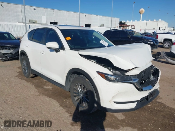 2019 Mazda CX-5 Touring with VIN JM3KFACM4K1668352, listed as a IAAI auction lot 41481291 with 65,901 mi miles and . Bid and sale history available at carsss.com. Image 1.