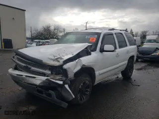 2001 Chevrolet Tahoe LS with VIN 1GNEK13T81R201211, listed as a Copart auction lot 37158552 with 0 mi miles and Salvage Title. Bid and sale history available at carsss.com. Image 2.