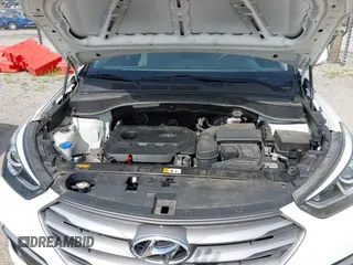 2017 Hyundai Santa Fe 2.4L with VIN 5NMZTDLB5HH018198, listed as a IAAI auction lot 42523632 with 144,883 mi miles and . Bid and sale history available at DreamBid. Image 10.