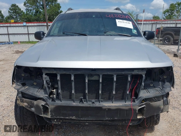 2002 Jeep Grand Cherokee Laredo with VIN 1J4GX48S32C288387, listed as a IAAI auction lot 42212249 with 151,028 mi miles and . Bid and sale history available at DreamBid. Image 13.