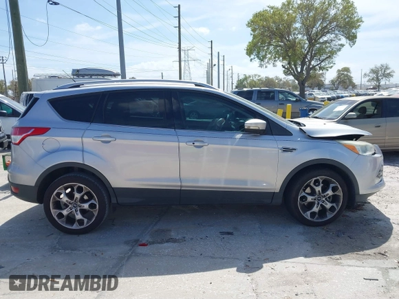 2014 Ford Escape Titanium с VIN 1FMCU0J9XEUB93591, выставлен на аукционе IAAI как лот 41721869 с пробегом 98 859 миль миль и . История ставок и продаж доступна на DreamBid. Изображение 13.