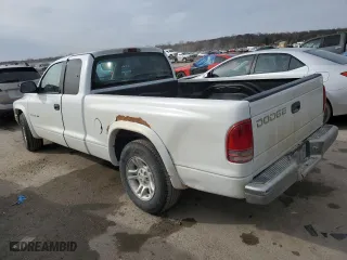 2001 Dodge Dakota Sport with VIN 1B7GL22N31S250879, listed as a Copart auction lot 47322845 with 207,334 mi miles and Salvage Title. Bid and sale history available at carsss.com. Image 2.