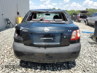 2009 Kia Rio LX with VIN KNADE223296539006, listed as a Copart auction lot 69229394 with 227,766 mi miles and Salvage Title. Bid and sale history available at DreamBid. Image 6.