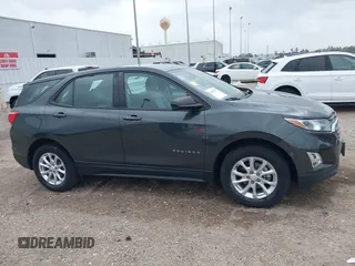 2018 Chevrolet Equinox LS with VIN 3GNAXHEV0JS506562, listed as a IAAI auction lot 41925572 with 97,031 mi miles and . Bid and sale history available at DreamBid. Image 13.