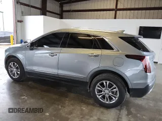 2023 Cadillac XT5 AWD Premium Luxury with VIN 1GYKNDR49PZ222592, listed as a Copart auction lot 79759624 with 32,177 mi miles and Clean Title. Bid and sale history available at DreamBid. Image 2.