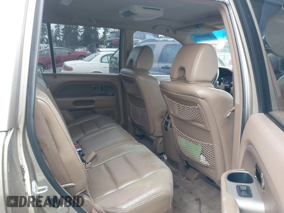 2006 Honda Pilot EX-L with VIN 2HKYF18706H529579, listed as a IAAI auction lot 41861069 with 222,641 mi miles and . Bid and sale history available at DreamBid. Image 8.