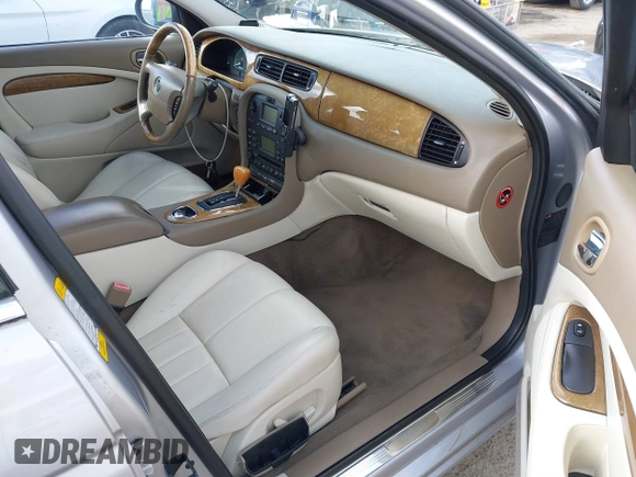 2003 Jaguar S-Type with VIN SAJEA01T83FM48713, listed as a IAAI auction lot 41402152 with 142,875 mi miles and . Bid and sale history available at DreamBid. Image 5.