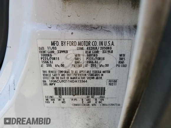 2004 Ford Escape XLS with VIN 1FMCU92114DA15564, listed as a Copart auction lot 59358015 with 186,135 mi miles and Salvage title. Bid and sale history available at DreamBid. Image 13.