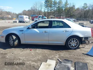 2011 Cadillac STS RWD w/1SB with VIN 1G6DW6ED8B0132119, listed as a IAAI auction lot 42001276 with 148,678 mi miles. Bid and sale history available at carsss.com. Image 14.
