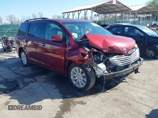 2015 Toyota Sienna Limited z VIN 5TDDK3DC0FS104012, wystawiony jako IAAI lot #41935233 z przebiegiem 160 635 mil mil oraz . Historia ofert i sprzedaży dostępna na DreamBid. Obrazek 1.
