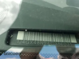 2004 Jeep Grand Cherokee Laredo z VIN 1J4GX48N94C386031, wystawiony jako Copart lot #55804755 z przebiegiem 160 103 mil mil oraz Szkoda całkowita • Salvage title. Historia ofert i sprzedaży dostępna na DreamBid. Obrazek 13.