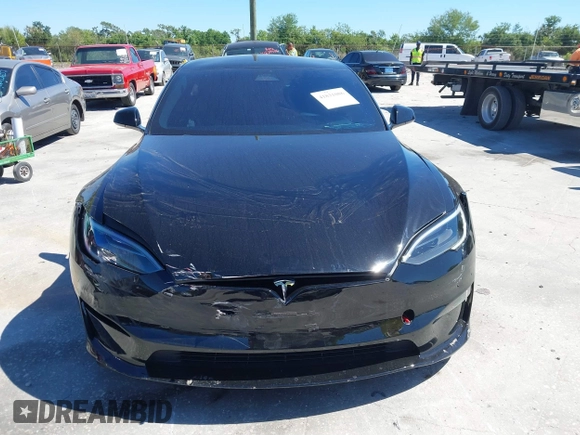 2023 Tesla Model S Plaid with VIN 5YJSA1E67PF528171, listed as a IAAI auction lot 41831086 with Not provided miles and . Bid and sale history available at DreamBid. Image 11.