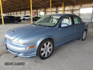 2004 Jaguar X-Type with VIN SAJEA51C14WE06627, listed as a Copart auction lot 54925735 with 107,756 mi miles and Clean Title. Bid and sale history available at DreamBid. Image 1.