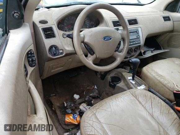 2006 Ford Focus SE with VIN 1FAFP36N66W149227, listed as a Copart auction lot 56008385 with 226,599 mi miles and Salvage title. Bid and sale history available at DreamBid. Image 8.