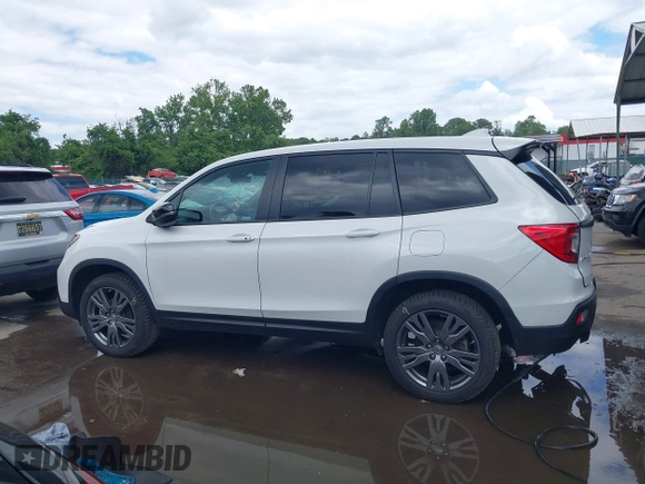 2021 Honda Passport EX-L with VIN 5FNYF8H54MB041738, listed as a IAAI auction lot 42310470 with 52,409 mi miles and . Bid and sale history available at DreamBid. Image 14.