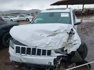 2014 Jeep Grand Cherokee Overland with VIN 1C4RJFCG9EC162098, listed as a IAAI auction lot 41746022 with 120,588 mi miles and . Bid and sale history available at DreamBid. Image 11.