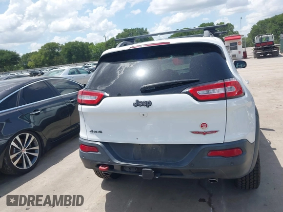 2014 Jeep Cherokee Trailhawk with VIN 1C4PJMBS5EW231448, listed as a IAAI auction lot 42632143 with 97,461 mi miles and . Bid and sale history available at DreamBid. Image 16.