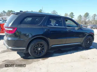 2015 Dodge Durango SXT with VIN 1C4RDJAG3FC695918, listed as a IAAI auction lot 41715629 with 143,460 mi miles and . Bid and sale history available at DreamBid. Image 13.
