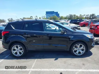 2019 Ford Escape Titanium with VIN 1FMCU9J98KUA21480, listed as a IAAI auction lot 42698275 with 65,478 mi miles and . Bid and sale history available at DreamBid. Image 13.