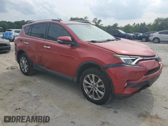 2016 Toyota RAV4 Limited with VIN JTMYFREV9GJ089887, listed as a Copart auction lot 54588955 with 130,910 mi miles and Salvage title. Bid and sale history available at DreamBid. Image 4.