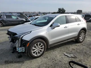 2019 Cadillac XT4 AWD Luxury with VIN 1GYFZBR44KF135140, listed as a Copart auction lot 83211944 with 39,589 mi miles and Salvage Title. Bid and sale history available at carsss.com. Image 1.