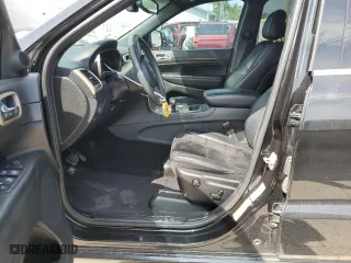 2015 Jeep Grand Cherokee Laredo with VIN 1C4RJFAG5FC724874, listed as a Copart auction lot 52462214 with 99,650 mi miles and Salvage Title. Bid and sale history available at carsss.com. Image 7.