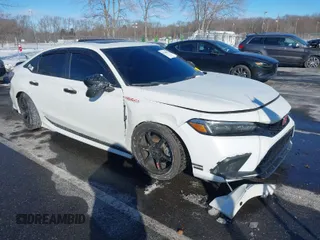 2022 Honda Civic Si with VIN 2HGFE1E55NH475153, listed as a IAAI auction lot 41269072 with 33,684 mi miles and . Bid and sale history available at DreamBid. Image 1.