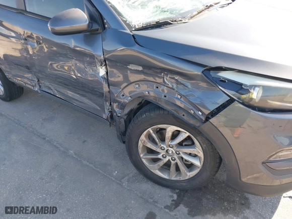 2016 Hyundai Tucson SE with VIN KM8J33A44GU209299, listed as a IAAI auction lot 41793611 with 42,417 mi miles. Bid and sale history available at carsss.com. Image 6.