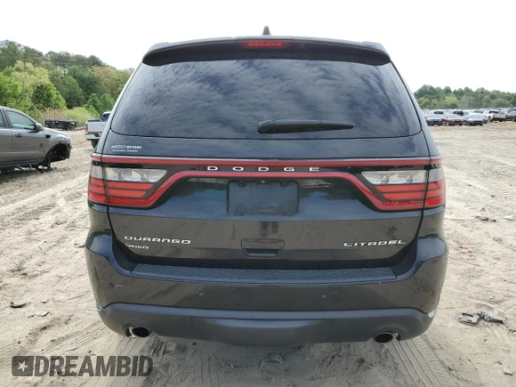2014 Dodge Durango Citadel z VIN 1C4SDJET6EC267350, wystawiony jako Copart lot #56128585 z przebiegiem 259 339 mil mil oraz Szkoda całkowita • Salvage title. Historia ofert i sprzedaży dostępna na DreamBid. Obrazek 6.