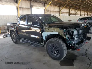 2025 Nissan Frontier S with VIN 1N6ED1EK6SN623961, listed as a Copart auction lot 57083555 with 4,720 mi miles and Salvage title. Bid and sale history available at DreamBid. Image 4.