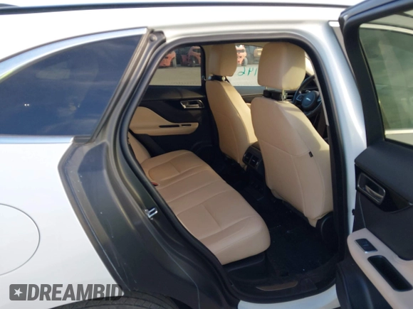 2020 Jaguar F-Pace 25t Premium z VIN SADCJ2FXXLA631058, wystawiony jako IAAI lot #42114146 z przebiegiem 56 763 mil mil oraz . Historia ofert i sprzedaży dostępna na DreamBid. Obrazek 8.