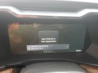 2024 GMC Canyon 4WD AT4 z VIN 1GTP6DEK1R1185858, wystawiony jako Copart lot #45866495 z przebiegiem 2069 mil mil oraz Szkody całkowita. Historia ofert i sprzedaży dostępna na DreamBid. Obrazek 9.