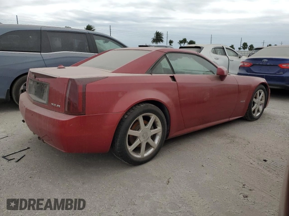 2005 Cadillac XLR z VIN 1G6YV34A855601016, wystawiony jako Copart lot #74436784 z przebiegiem Nie podano mil oraz Szkody całkowita. Historia ofert i sprzedaży dostępna na DreamBid. Obrazek 3.