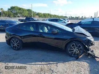 2024 Toyota Prius LE with VIN JTDACAAU8R3038090, listed as a IAAI auction lot 41518657 with 173 mi miles. Bid and sale history available at carsss.com. Image 13.