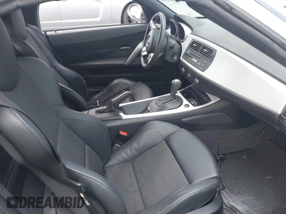 2006 BMW Z4 3.0i with VIN 4USBU33596LW69200, listed as a IAAI auction lot 41774419 with 59,691 mi miles and . Bid and sale history available at DreamBid. Image 5.