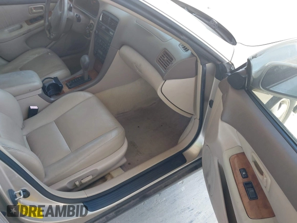 1999 Lexus ES 300 Luxury Sport Sdn with VIN JT8BF28G0X5065317, listed as a IAAI auction lot 42080216 with 163,223 mi miles. Bid and sale history available at carsss.com. Image 5.