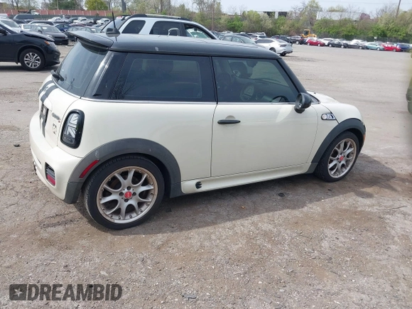 2008 MINI Hardtop S with VIN WMWMF73578TV33406, listed as a IAAI auction lot 42081596 with 120,183 mi miles and . Bid and sale history available at DreamBid. Image 4.