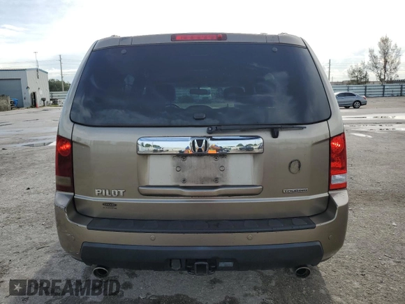 2010 Honda Pilot Touring with VIN 5FNYF3H81AB016255, listed as a Copart auction lot 71052644 with 96,847 mi miles and Salvage Title. Bid and sale history available at DreamBid. Image 6.