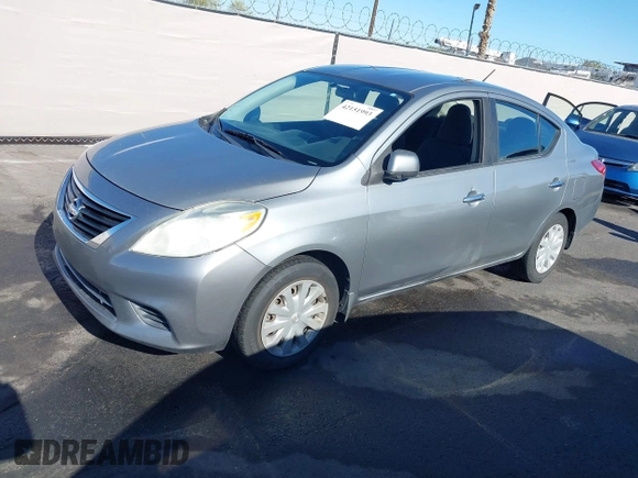 2012 Nissan Versa SV with VIN 3N1CN7AP0CL921230, listed as a IAAI auction lot 42151993 with 184,676 mi miles. Bid and sale history available at carsss.com. Image 2.