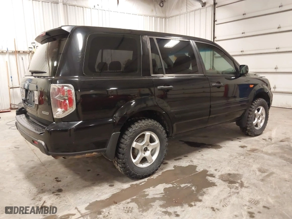 2007 Honda Pilot LX with VIN 5FNYF18117B009290, listed as a IAAI auction lot 41205310 with 150,081 mi miles. Bid and sale history available at carsss.com. Image 4.