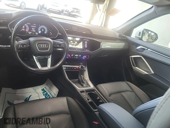 2023 Audi Q3 S line Premium with VIN WA1DECF34P1106228, listed as a IAAI auction lot 42734425 with 52,167 mi miles and . Bid and sale history available at DreamBid. Image 45.