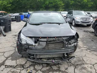 2016 Buick Cascada Premium с VIN W04WT3N58GG103797, выставлен на аукционе Copart как лот 55849665 с пробегом 41 912 миль миль и Списание • Salvage title. История ставок и продаж доступна на DreamBid. Изображение 5.