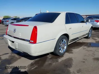 2010 Cadillac DTS w/1SC with VIN 1G6KD5EY6AU134372, listed as a IAAI auction lot 41786835 with 95,354 mi miles. Bid and sale history available at carsss.com. Image 4.