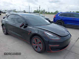 2023 Tesla Model 3 with VIN 5YJ3E1EA5PF484040, listed as a IAAI auction lot 42128327 with 51,210 mi miles and . Bid and sale history available at DreamBid. Image 1.