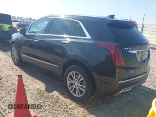 2023 Cadillac XT5 AWD Premium Luxury with VIN 1GYKNDRS7PZ158566, listed as a IAAI auction lot 41763127 with 58,248 mi miles and . Bid and sale history available at DreamBid. Image 3.