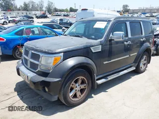 2007 Dodge Nitro SLT z VIN 1D8GT58K27W578490, wystawiony jako IAAI lot #42335125 z przebiegiem 125 826 mil mil oraz . Historia ofert i sprzedaży dostępna na DreamBid. Obrazek 2.